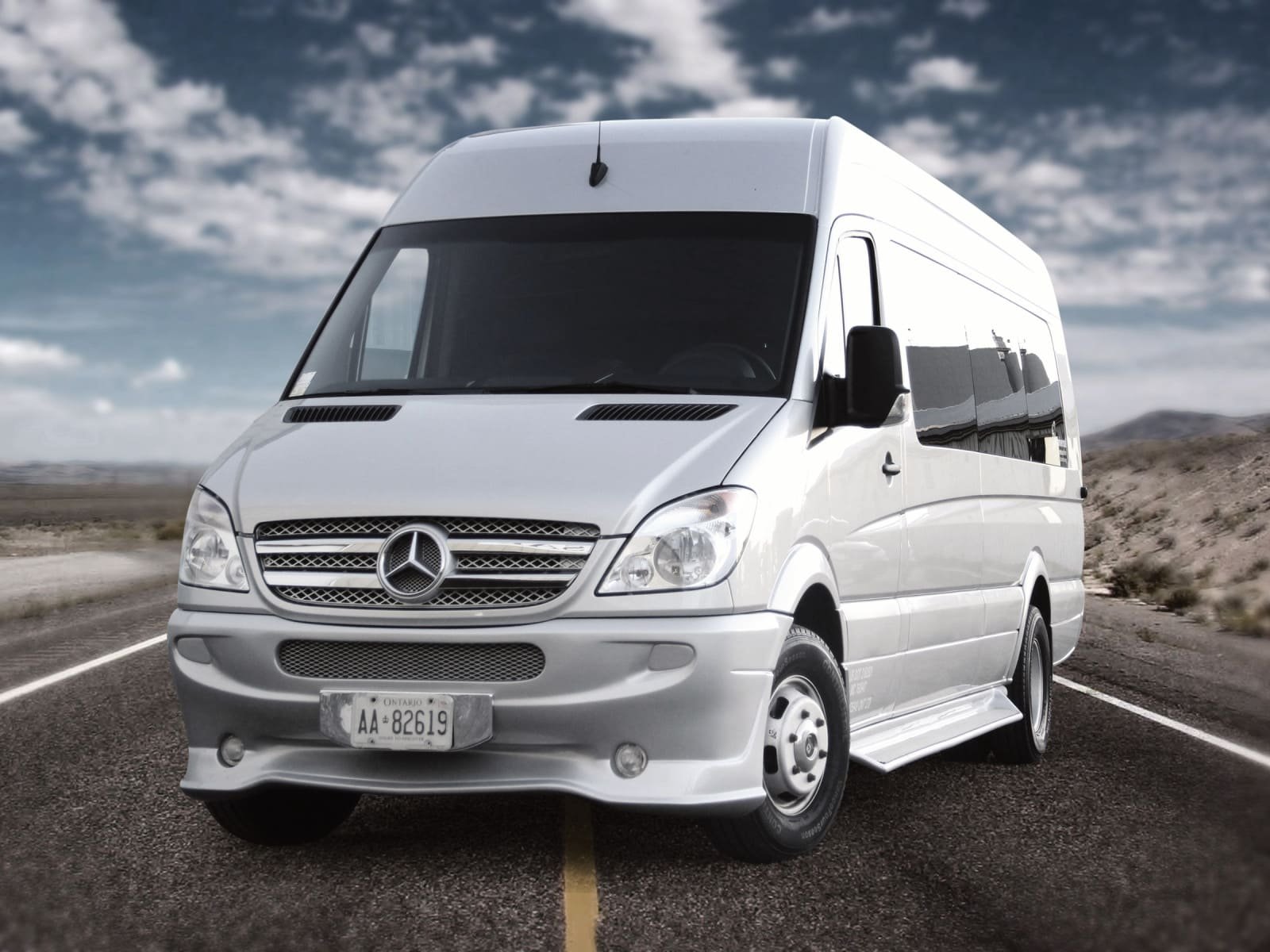 A Universal professional chauffeur opening doors for clients using Limousine Service